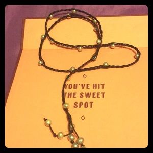 Leather braided with fresh water pearls. Handmade